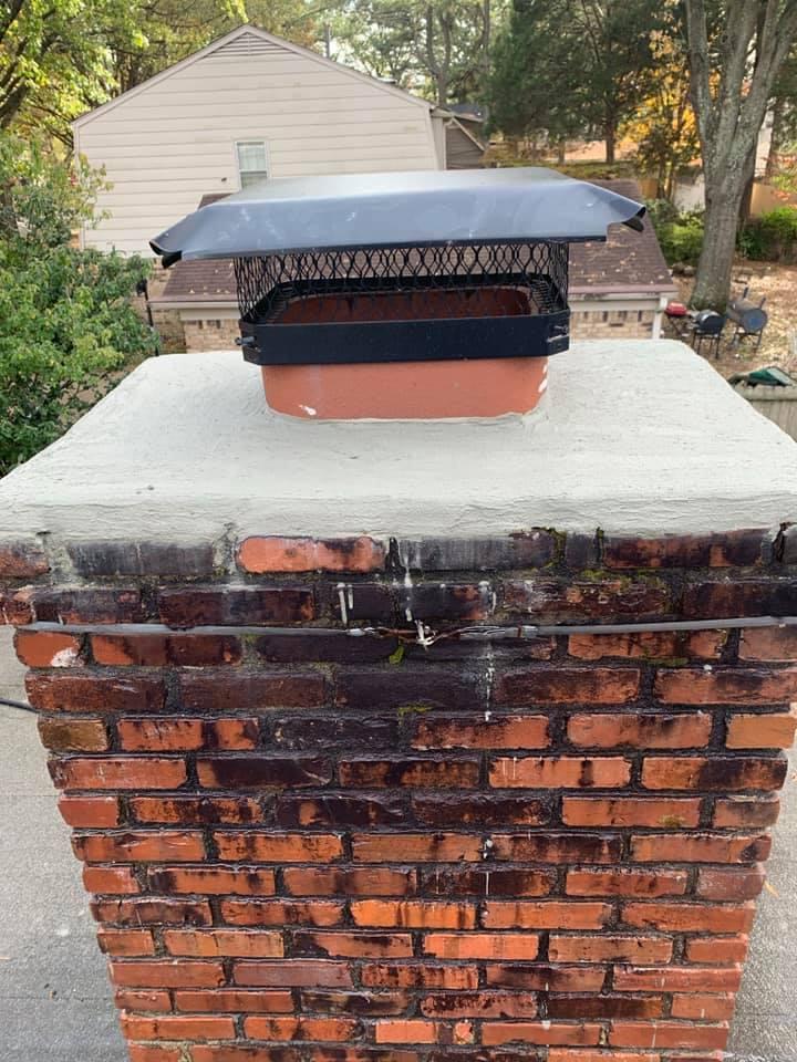 Healthy Home Pros technician cleaning a chimney in the Memphis area
